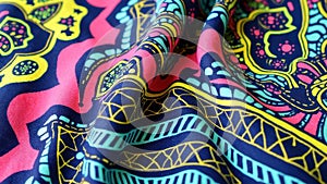 Vivid colorful african fabric with intricate geometric patterns and textures