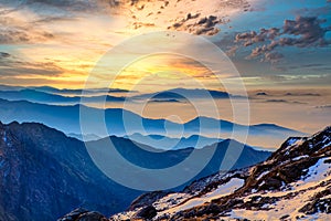 Himalaya golden orange sunrise over blue mountains at Laurebina La pass, Himalayas, Nepal