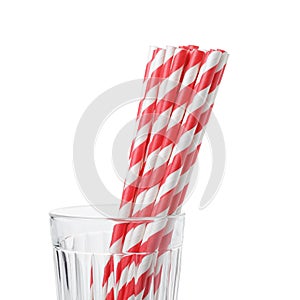 Vivid eco friendly striped paper straws in glass photo