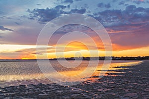 Vivid glowing sunset at Inverloch foreshore beach, Australia