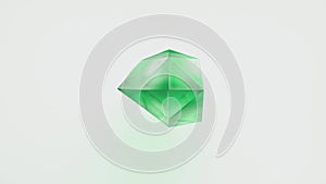 A vivid green jewelry polyhedron arbitrarily transforming on white background. Dynamic backdrop for art, business and