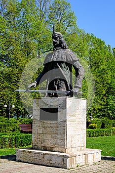 Vivid green trees and grass in Chindia Park (Parcul Chindia) from Targoviste city in Romania in a sunny spring day