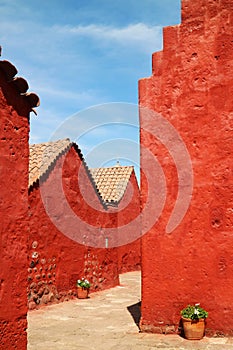 Vivid orange red colored of nun's living quarter in Santa Catalina Monastery, UNESCO world heritage site in Arequipa, Peru