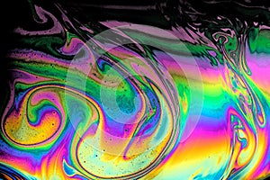 Vivid rainbow effect with black, trippy psychedelic abstract