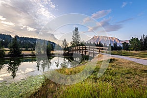 A vivid sunrise over Cascade Ponds