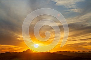 Vivid sunset over the mountains and desert of the Sonoran Desert