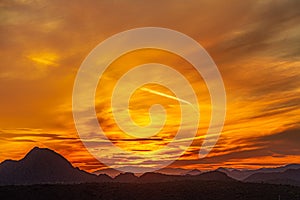 Vivid sunset over the mountains and desert of the Sonoran Desert