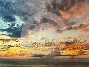 Vivid sunset over Pacific Ocean with Threatening Clouds