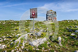 Vivid Trem summit stone and signpost on Dry mountain in Serbia photo