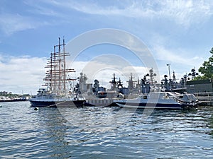 Vladivostok, Russia,  July, 13, 2020. Military ships and sailing ship `Sedov` in the bay `Golden horn`. Vladivostok, Russia.