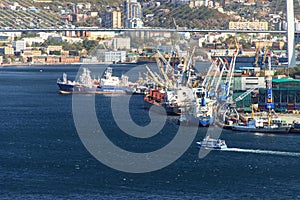 View of the Golden Horn Bay, the Golden Bridge and the fishing port of Vladivostok from the top of Krestovaya Sopka