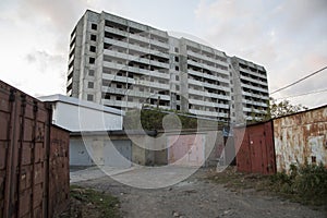 VLADIVOSTOK, RUSSIA - 03/09/2021 a soviet empty abandoned unfinished haunted residential concrete panel house building