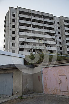 VLADIVOSTOK, RUSSIA - 03/09/2021 a soviet empty abandoned unfinished haunted residential concrete panel house building