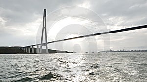 Vladivotok bridge. View from the moving ferry.