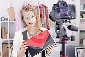 Vlogger holding a bag photo