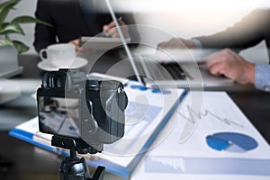 vlogger using laptop sharing her content making recording vide