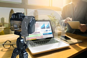 vlogger using laptop sharing her content making recording vide