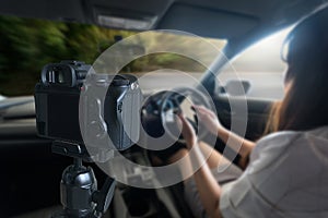 vlogger using laptop sharing her content making recording vide