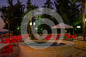 VLORA, ALBANIA: View of the cafe on the Kuzum Baba hill at sunset in Vlora.