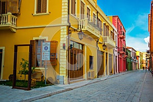 VLORA-VLORE, ALBANIA: Historical multi-colored buildings on the street in the city center.