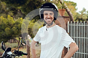 Vlose up Portrait of biker boy and black helmet photo