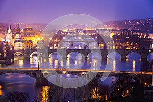 Vltava (Moldau) River at Prague with Charles Bridge at dusk