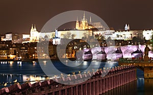 Vltava river, Charles Bridge (Stone Bridge, Prague Bridge) and St. Vitus Cathedral at night. Prague.