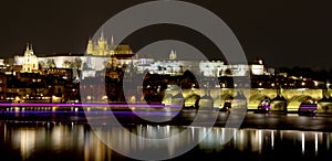 Vltava river, Charles Bridge (Stone Bridge, Prague Bridge) and St. Vitus Cathedral at night. Prague.