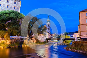 Vltava river long exposure night shot of the historic city of Cesky Krumlov with famous Cesky Krumlov Castle, Church city is on a