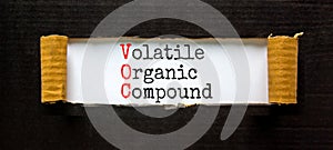 VOC volatile organic compound symbol. Concept words VOC volatile organic compound on beautiful white paper. Beautiful black photo