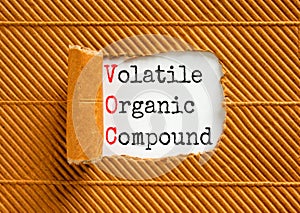 VOC volatile organic compound symbol. Concept words VOC volatile organic compound on beautiful white paper. Beautiful brown photo