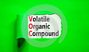 VOC volatile organic compound symbol. Concept words VOC volatile organic compound on beautiful white paper. Beautiful green photo