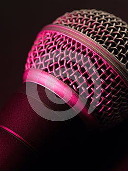 Vocal microphone in pink light