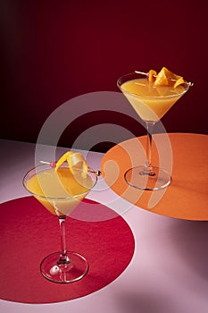 Vodka with orange juice cocktail garnished with orange peel