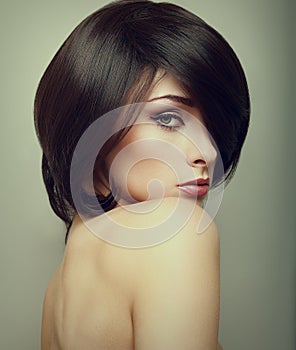 Vogue portrait of alluring woman with short hair