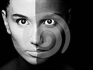 Vogue style portrait of a woman with b&w makeup