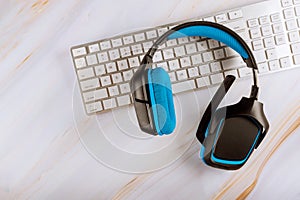 VOIP headset communication support, call center and customer service help desk on computer keyboard