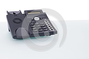 Voip phone on glass desk