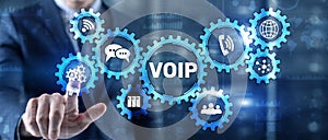 VoIP Voice over IP. Businessman pressing virtual screen Voice over Internet Protocol