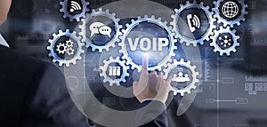 VoIP Voice over IP. Businessman pressing virtual screen Voice over Internet Protocol