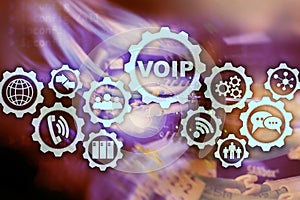 VoIP Voice over IP on the screen with a blur background of the server room