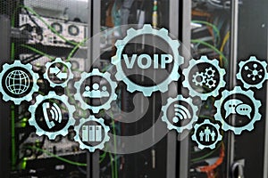 VoIP Voice over IP on the screen with a blur background of the server room. The concept of Voice over Internet Protocol.