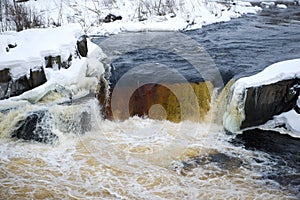 Voitsky Padun waterfall, February afternoon. Karelia, Russia photo