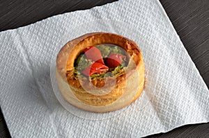 Vol-au-vent with mushroom and chicken, on white paper