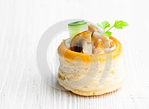 Vol-au-vents puff pastry cases filled with mushrooms and chicke