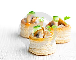 Vol-au-vents puff pastry cases filled with mushrooms and chicke