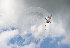 A volador flying dancer performing the traditional Danza de los Voladores Dance of the Flyers in Papantla