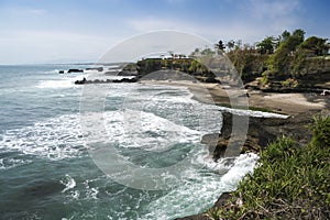 Volcanic coastline tanah lot bali indonesia