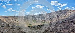 Volcanic crater of Caldera Blanca, old volcano in Lanzarote, Canary islands, Spain