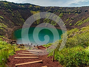 Volcanic crater lake Kerid or Kerith with turquoise water, Iceland